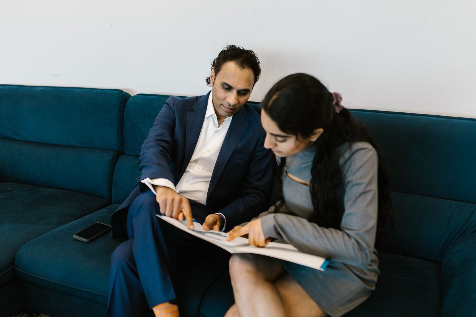 A Vision Wealth advisor going through a financial plan with a client