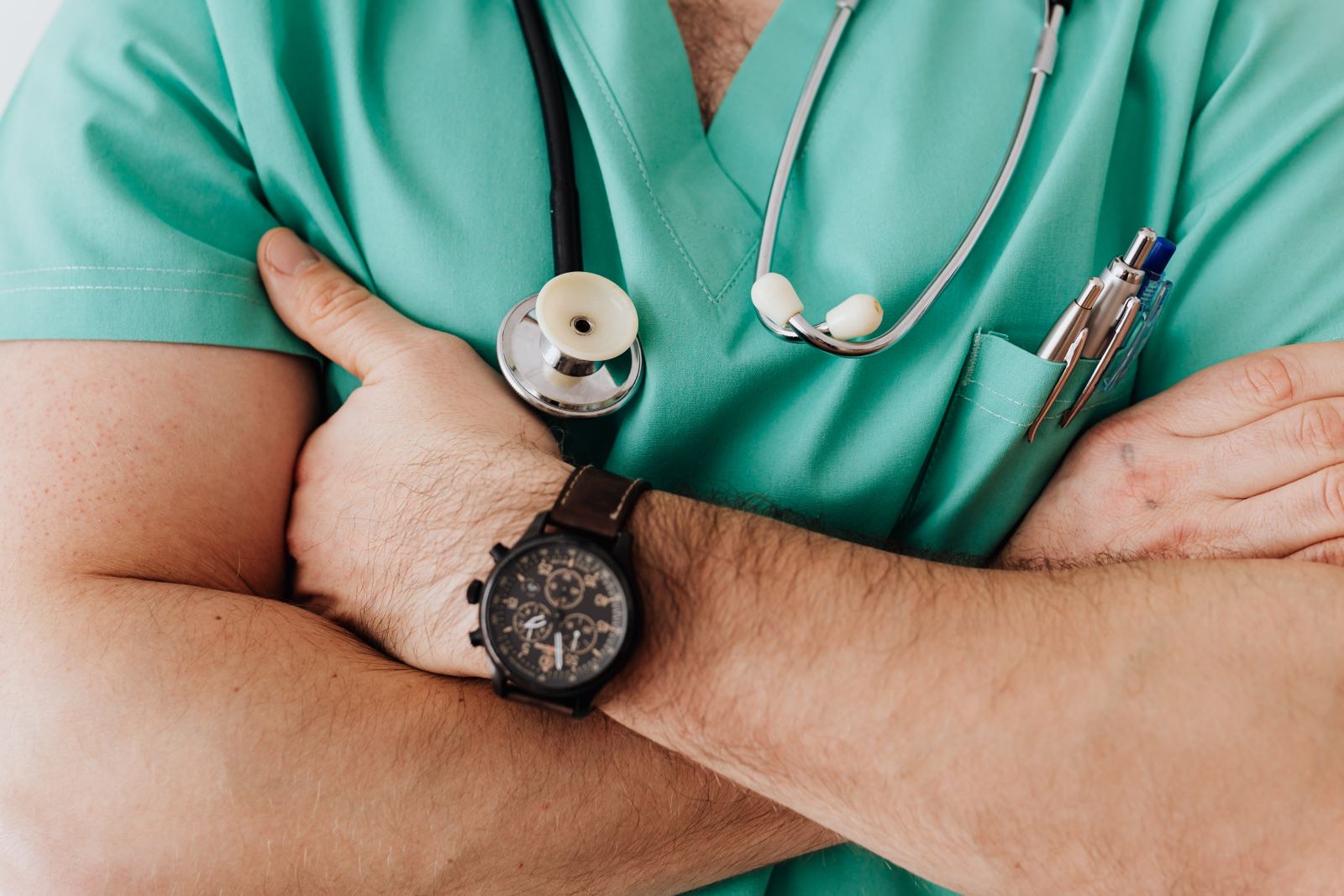 A doctor in scrubs with a stethoscope